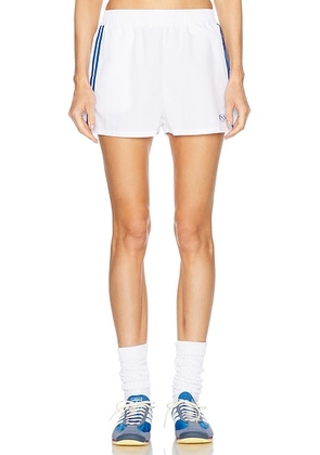 Sporty & Rich Runner Track Short in White - White. Size XL (also in ).