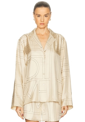 Toteme Monogram Silk PJ Top in Ivory Monogram - Ivory. Size 38 (also in 40).