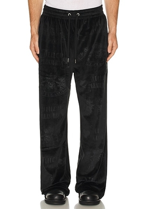 Pleasures Crest Velour Track Pants in Black - Black. Size L (also in ).