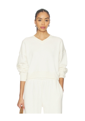 Eterne Cropped V-neck Sweatshirt in Cream. Size L. Also in XS, M.