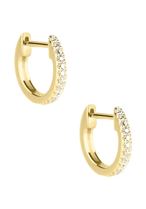 STONE AND STRAND White Diamond Pave Huggie Earrings in Metallic Gold.