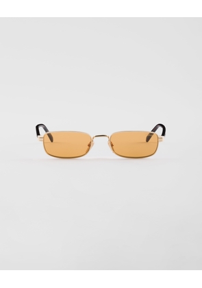 Sunglasses with the iconic metal plaque