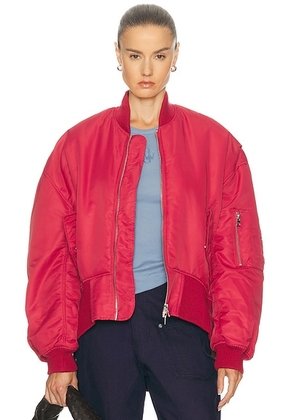JW Anderson Oversized Curved Hem Bomber Jacket in Ruby - Red. Size S (also in ).