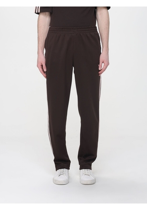 Pants ADIDAS ORIGINALS Men color Dark