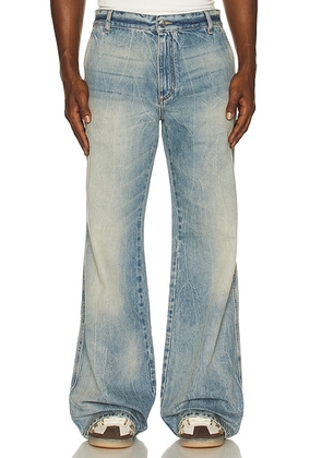 Amiri Boot Cut Jean in Retro Indigo - Blue. Size 30 (also in 31, 32, 34, 36).
