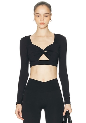 NORBA Shell Long Sleeve Top in Black - Black. Size XS (also in L, M, S).