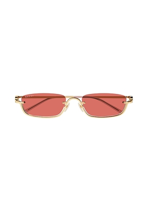 Gucci GG Upside Down Rectangular Sunglasses in Red.