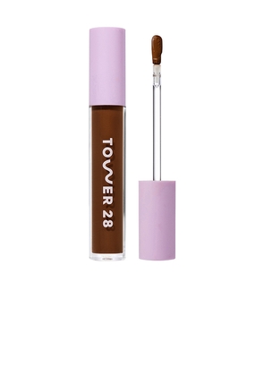 Tower 28 Swipe Serum Concealer in Brown.