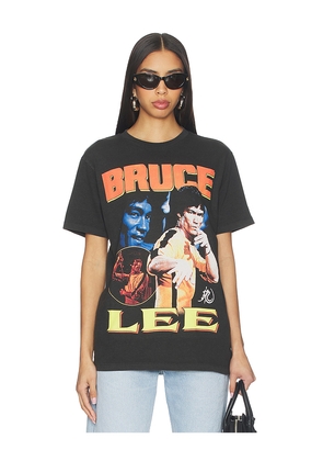 The Forecast Agency Yellow Jumpsuit Bruce Lee Tee in Black. Size XS. Also in L, M, S, XL/1X.