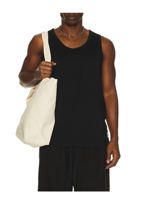 Reigning Champ Lightweight Jersey Slim Tank Top in Black. Size L. Also in M, S, XL/1X.