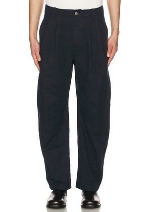 After Pray Curved Two Tuck Pants in Navy - Navy. Size S (also in ).