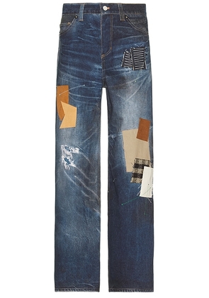 Andersson Bell Unisex Patchwork Printed Denim Trompe L`Oeil Jeans in Blue - Blue. Size 34 (also in ).