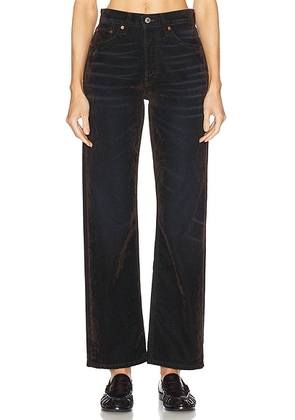 RE/DONE 90s High Rise Loose Jeans in Brown Flocked - Brown. Size 30 (also in ).