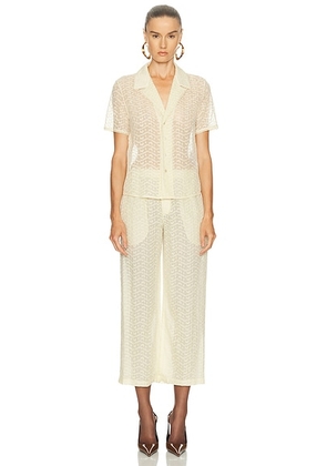 Saint Laurent Short Sleeve Jumpsuit in Jaune Pale - Cream. Size 38 (also in 40).