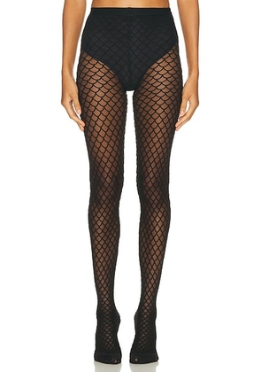 Wolford Velvet Net Illusion Tights in Black & Black - Black. Size XS (also in ).