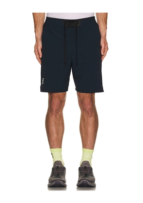 On Performance Hybrid Short in Navy. Size S. Also in XL/1X.
