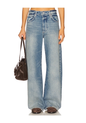 PAIGE Arellia Barrel Leg Jeans With Covered Buttonfly in Blue. Size 25. Also in 27, 28, 29, 30, 31, 32.