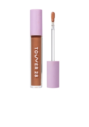Tower 28 Swipe Serum Concealer in Tan.