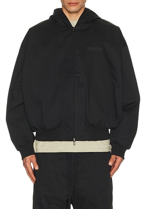 Fear of God ESSENTIALS Poly Cotton Twill Hoodie in Jet Black - Black. Size S (also in ).