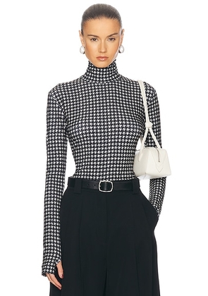 Norma Kamali Slim Fit Longsleeve Turtleneck Top in Large Houndstooth - Black. Size S (also in XS).