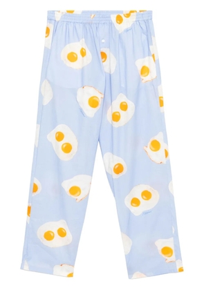 Moschino graphic-print trousers - Blue