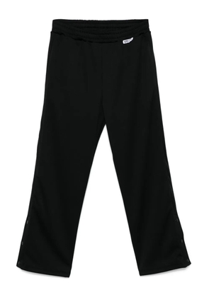 GCDS button-detail track pants - Black