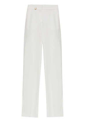 Jacquemus charm-detail trousers - White