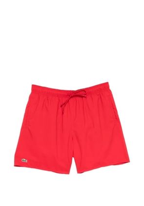 Lacoste logo-patched drawstring swim shorts - Red