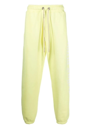 Palm Angels logo-print track pants - Yellow