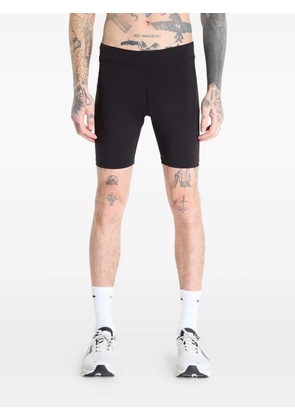 On logo-print performance shorts - Black