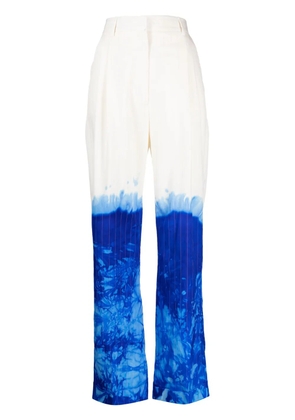 Stain Shade tie-dye wool suit trousers - White