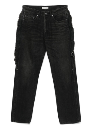 Undercover frayed-detailed jeans - Black
