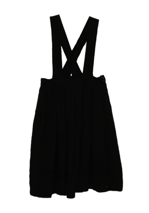 Black Comme Des Garçons pleated skirt