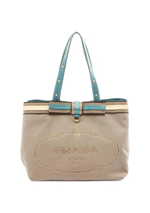 Prada Pre-Owned 2010s logo-jacquard studded tote bag - Neutrals