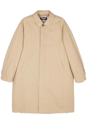 Undercover logo-print coat - Brown