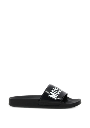 Moschino embossed logo-detail slides - Black
