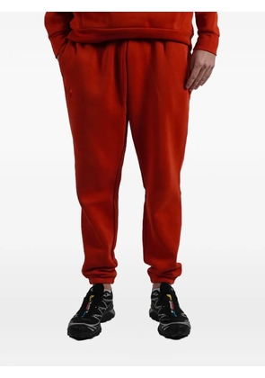 Under Armour side-pocket track pants - Orange
