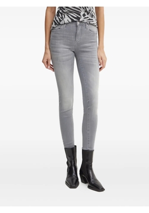 Armani Exchange logo-plaque skinny jeans - Grey