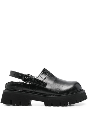 Moschino buckle embossed leather mules - Black