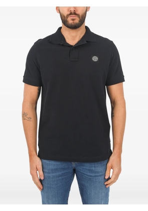 Stone Island logo-badge polo shirt - Black