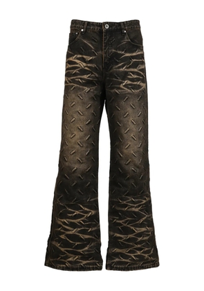 Who Decides War embossed trousers - Black