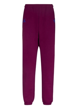 The North Face x KAWS track pants - Purple