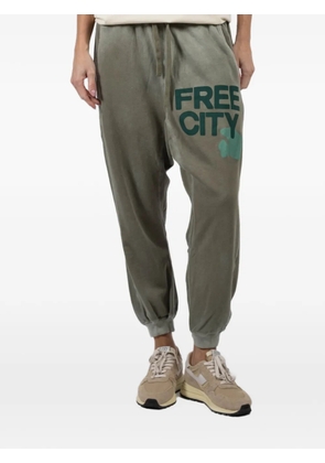 FreeCity Drawstring graphic trousers - Green