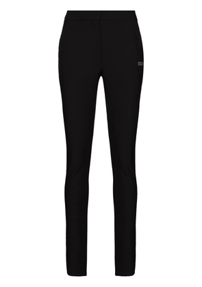 Off-White logo-print slim-fit trousers - Black