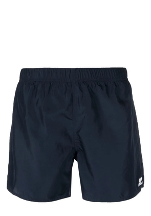 Courrèges logo-patch plain swim shorts - Blue