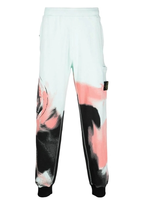 Stone Island Motion Saturation abstract-print track pants - Green