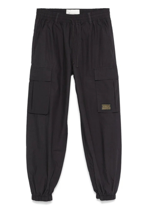 Champion logo-patch cargo trousers - Blue