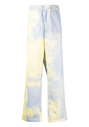 OAMC spray-paint straight-leg trousers - Yellow