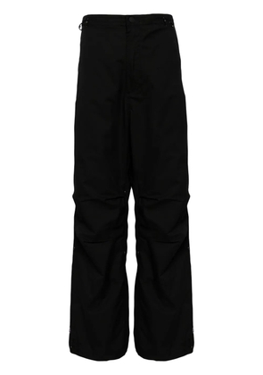 Maharishi x Jean-Michel Basquiat wide-leg trousers - Black