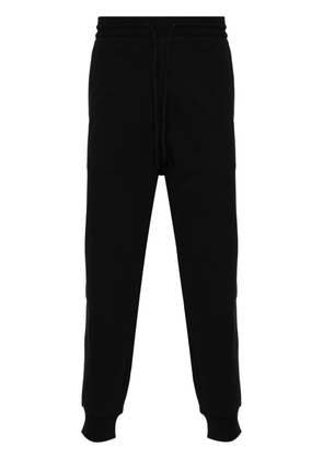 Y-3 logo-printed jersey trousers - Black